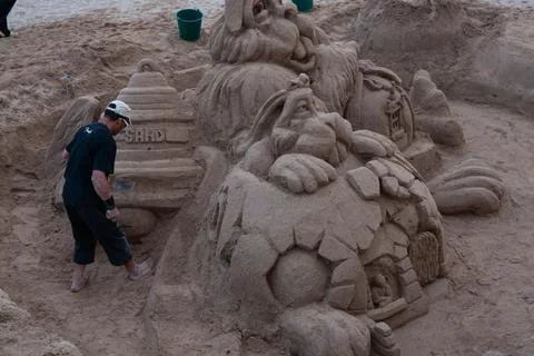 Sand sculpture in making on Cannes Beach Stock Photos