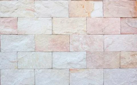 Sand stone brick wall for background Stock Photos