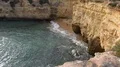 Sand stone cliffs with small hidden beach at Algarve coastline Portugal 4k or 4k+ Resolution