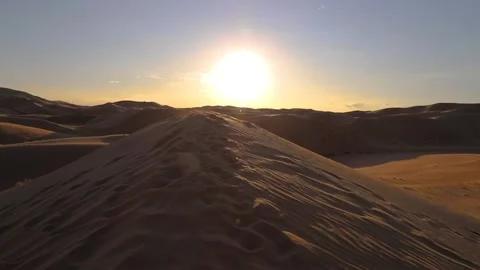 Sand storms in desert in windy day in XiangshaWan, or Singing sand Bay, in ho Stock Footage 136466119