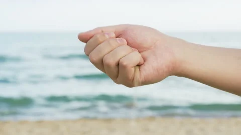 Sand Strewed by Hand at Beach Stock Footage 131545133
