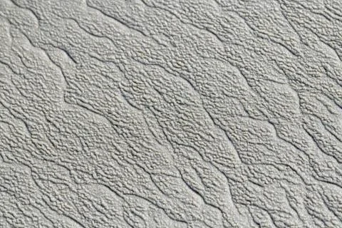 Sand structures in the beach of Terschelling . Stock Photos
