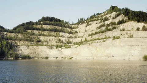 Sand surface mine with swimming pool, sandpit with outdoor water swimming area Vidéo 97989815