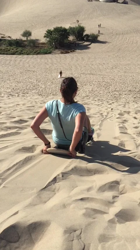 Sand surfing in Peru Stock Footage 133885522