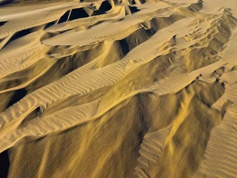 Sand texture as a background. sand of desert. yellow sand for designers Stock Photos