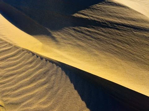 Sand texture as a background. sand of desert. yellow sand for designers Stock Photos
