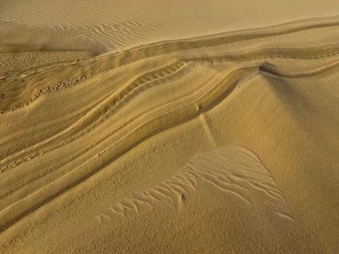 Sand texture as a background. sand of desert. yellow sand for designers Stock Photos