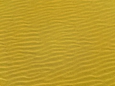 Sand texture as a background. sand of desert. yellow sand for designers Stock Photos