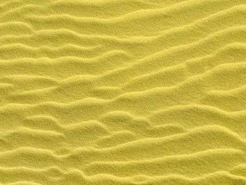 Sand texture as a background. sand waves in the desert. golden sand for des.. Stock Photos
