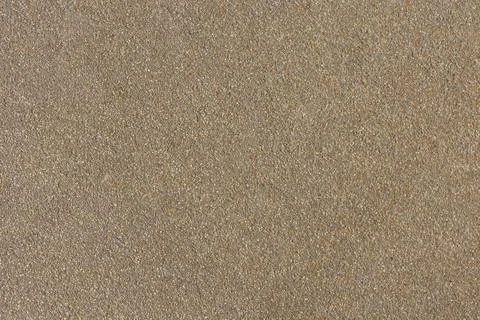 Sand texture background. Sandy beach pattern near sea. Desert ground. Fine gr Stock Photos