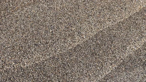 Sand texture pattern and stone seamless loop. Summer beach background. Stock Footage 225092697