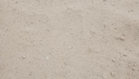 Sand texture. Sandy beach for background. Top view Stock Photos