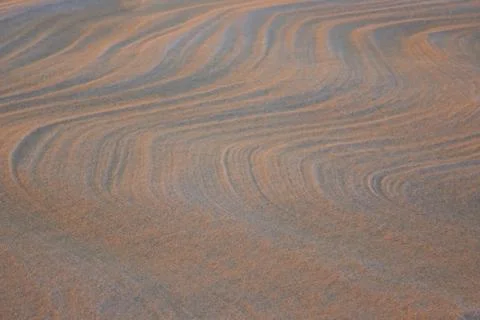 Sand texture, wavy lines. Stock Photos