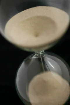 Sand through an Hourglass Stock Footage 836714