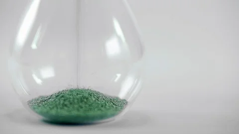 Sand Timer in Slow Motion Stock Footage 99692309