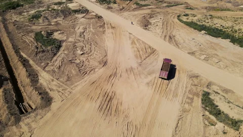 Sand transport from open pit. Dump truck transports sand in open-pit 動画素材 156627154
