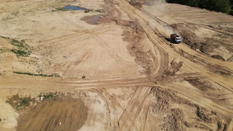 Sand transport from open pit. Dump truck transports sand and gravel Видео 156629575