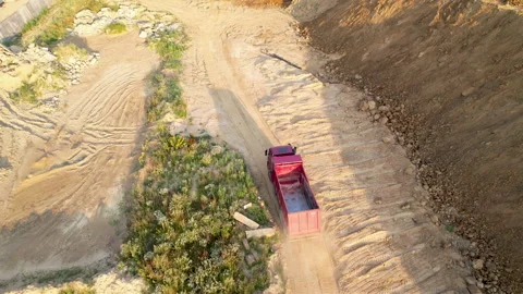 Sand transport from open pit. Dump truck transports sand in open-pit 動画素材 161963509
