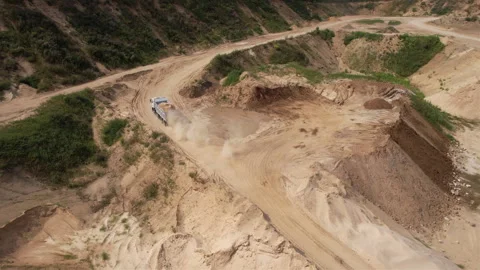 Sand transport from open pit. Dump truck transports sand in open-pit Stock Footage 161971740