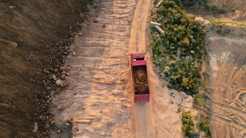 Sand transport from open pit. Dump truck transports sand and gravel Stock Footage 167381059