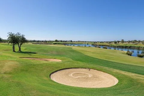Sand trap on golf course. Stock Photos