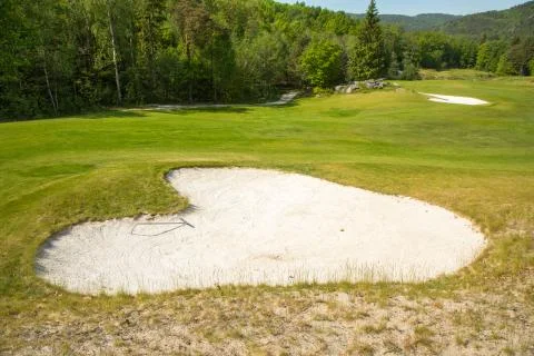 Sand trap in a golf course sand bunkers heart shape Stock Photos