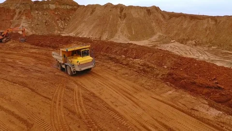 Sand truck moving at sand mine. Mining industry. Sand quarry Stock Footage