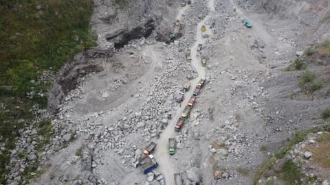 Sand trucks on the slopes of Mount Merapi Foto stock