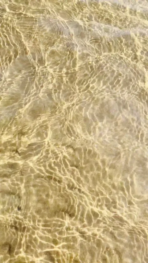 Sand under water waves Stock Footage 139772688