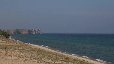 Sand, waves and the lake Stock Footage