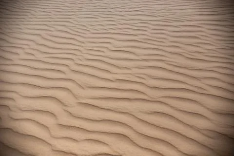 Sand waves background texture in Egypt Stock Photos