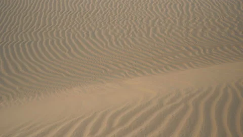 Sand waves on a desert at the end of the day, in Mui Ne, Vietnam Stock Footage 232377114