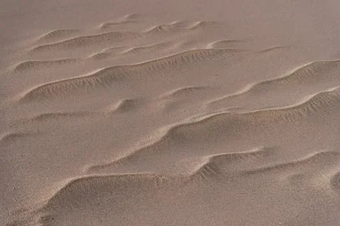Sand in waves made by the wind, medium plan, Great Sand Dunes National Park.. Stock Photos