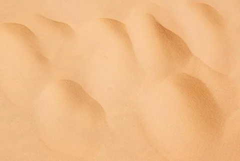 Sand with waves Stock Photos