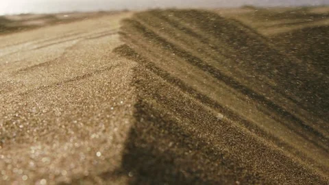 Sand waving in the wind in dunes in desert Stock Footage 296535699
