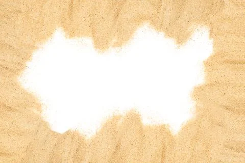 Sand on a white background in a top view with copy space Foto stock