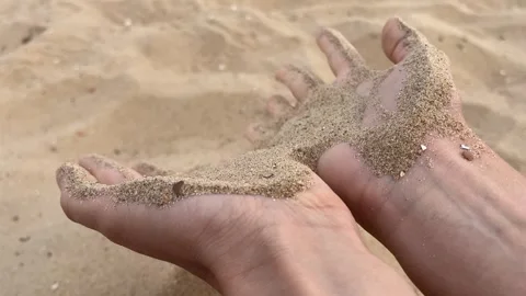 Sand in woman's hands Stock Footage 313368433