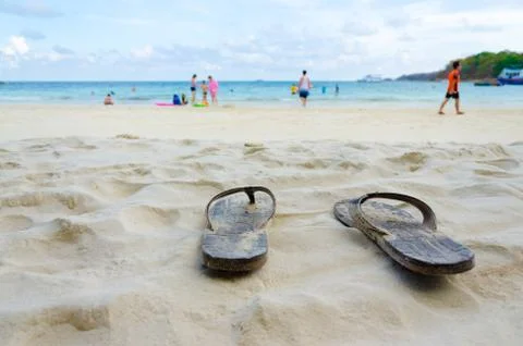Sandal on the beach Stock Photos