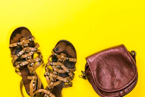 Sandals, bag on a colored background. Stock Photos