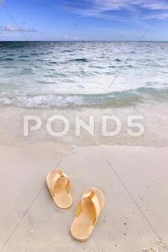 Sandals by the beach Stock Photos