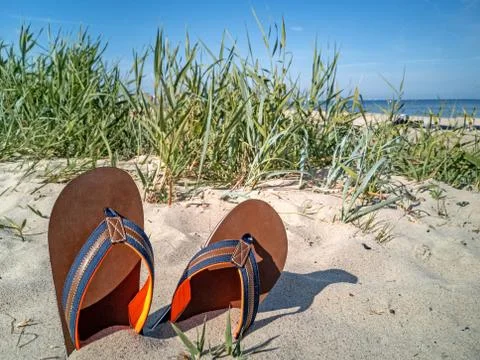 Sandals on the beach Stock Photos