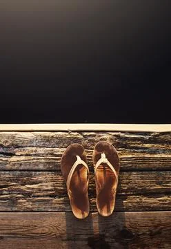 Sandals, black background and deck for travel, mockup space or holiday on v.. Stock Photos
