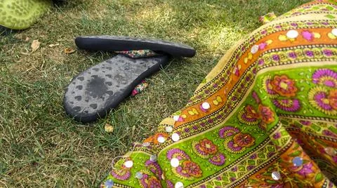 Sandals in the grass Stock Photos