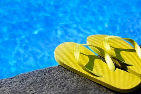 Sandals by a pool Stock Photos