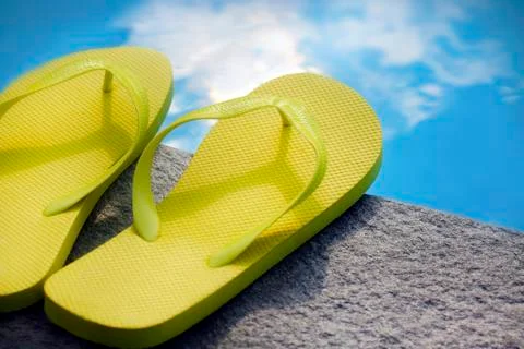 Sandals by a pool Stock Photos
