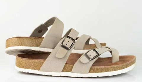 Sandals on a white background with simple design and straps Stockfoto's