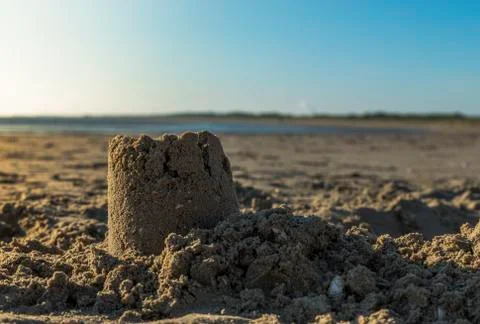Sandcastel at the beach Stock Photos