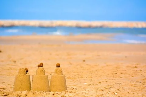 Sandcastles on the beach Stock Photos
