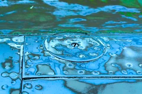 Sanded steel surface with rivets blue and green color Stock Photos