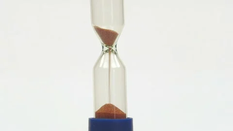 Sandglass isolated on white background. Time is running. Hourglass with falling Stock Footage 201383328